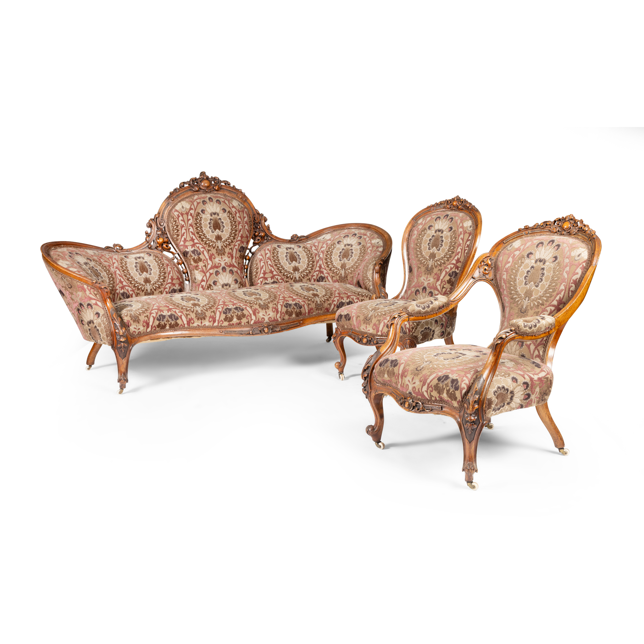 A MID VICTORIAN WALNUT SOFA