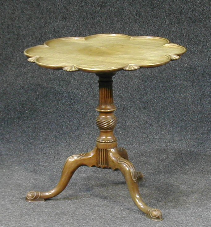 A George III circular mahogany supper table,