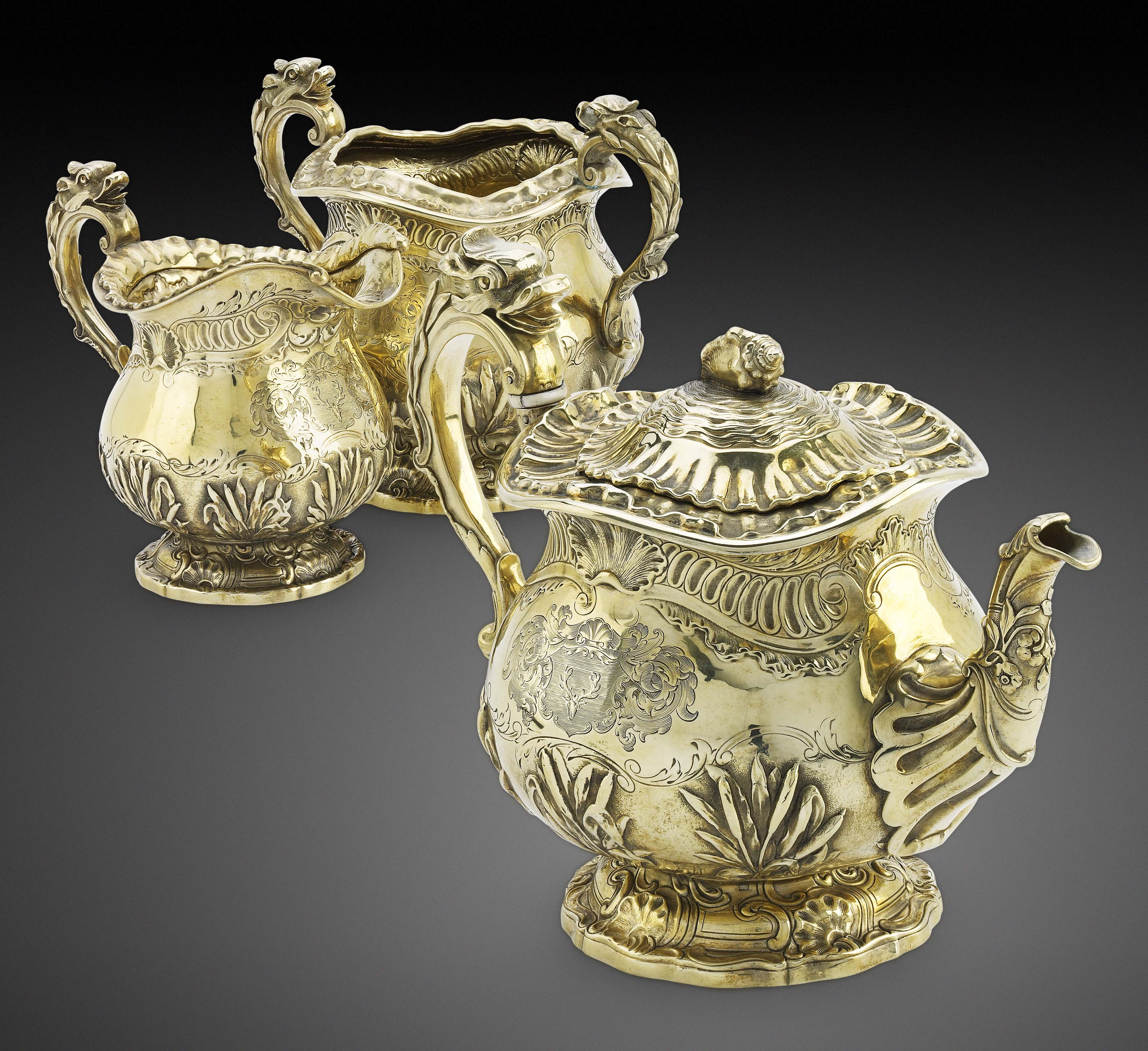 A George IV three-piece silver-gilt tea service