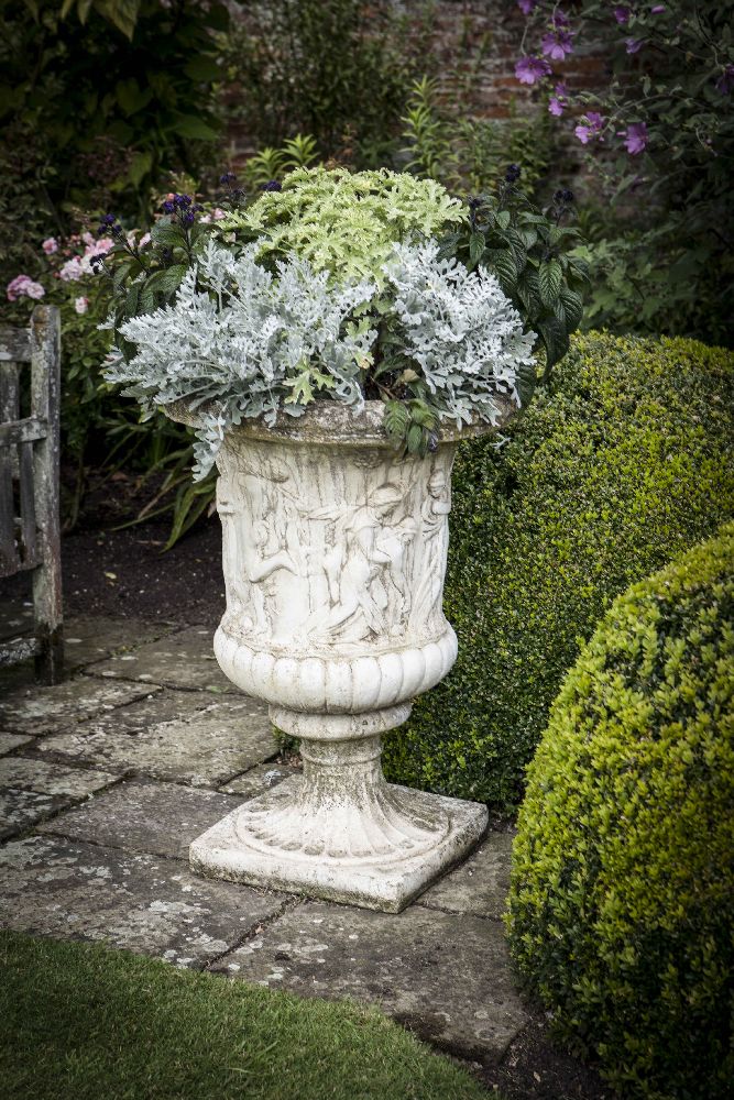 PAIR OF CAST STONE GARDEN URNS