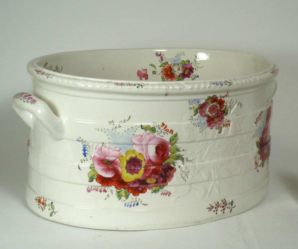 A 19th century ceramic footbath and ewer