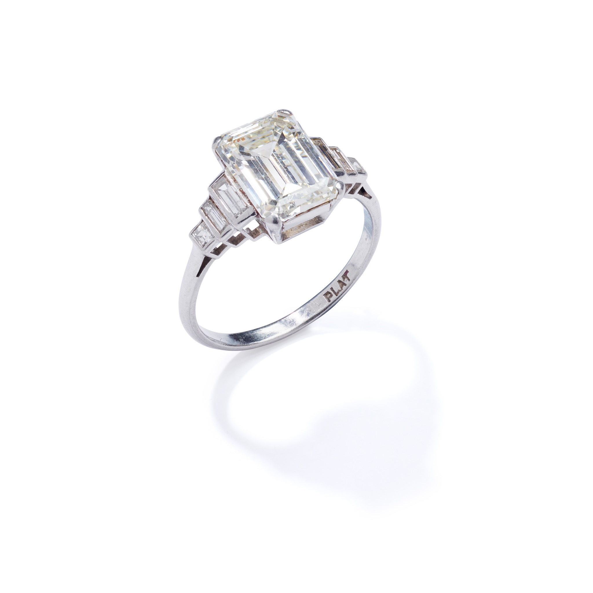A rectangular and baguette-cut diamond single-stone ring