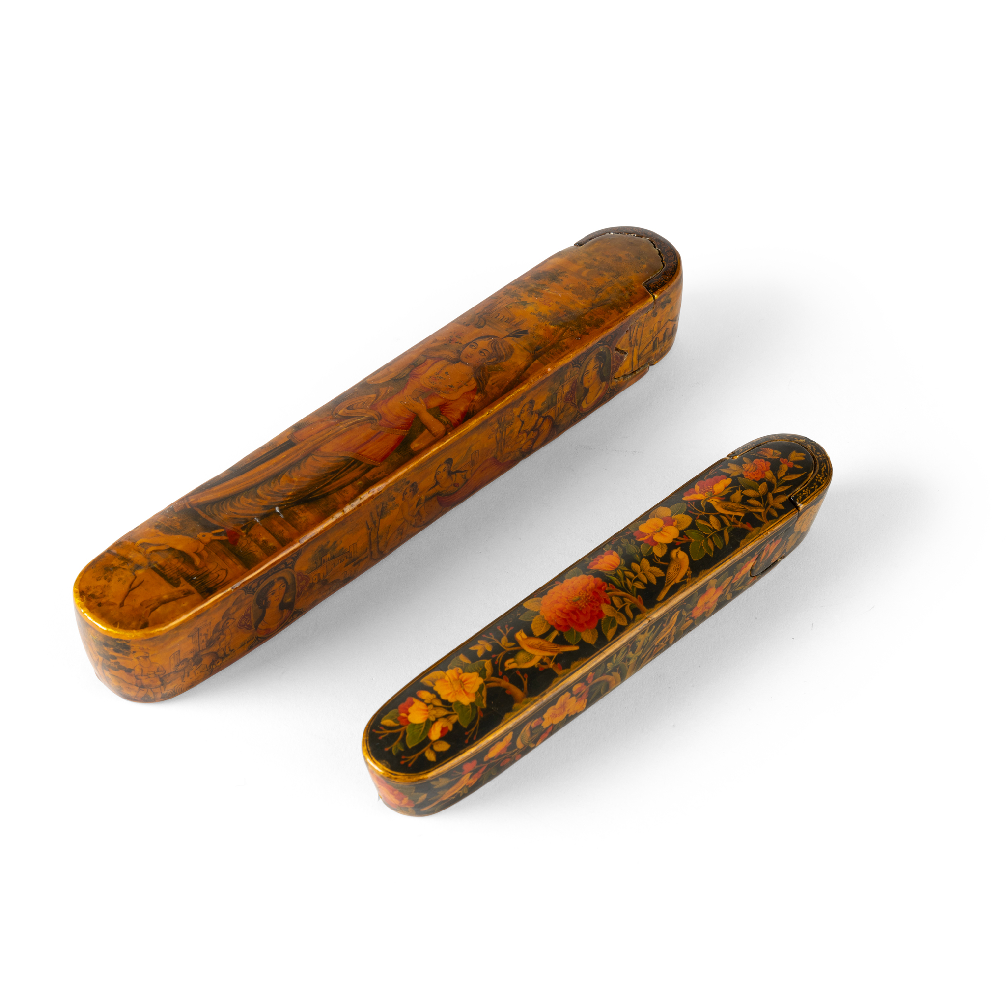 TWO QAJAR LACQUERED PAPIER MACHE PENBOXES (QALAMDAN)