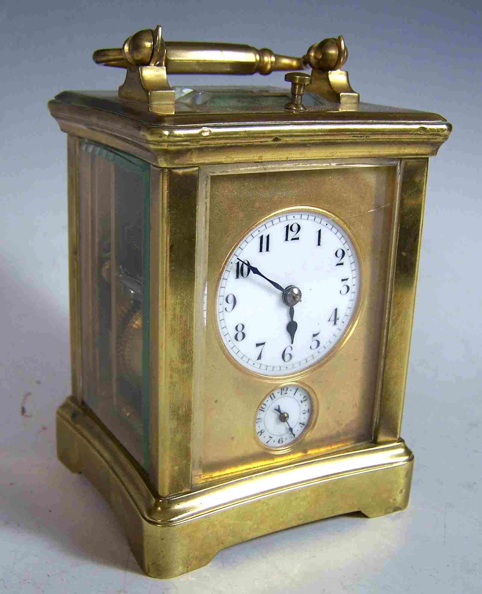 A late 19th century French brass cased hour repeater carriage clock,