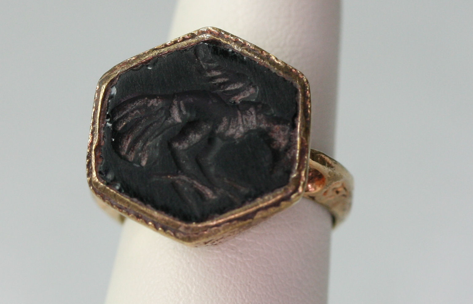 An antique intaglio set ring,