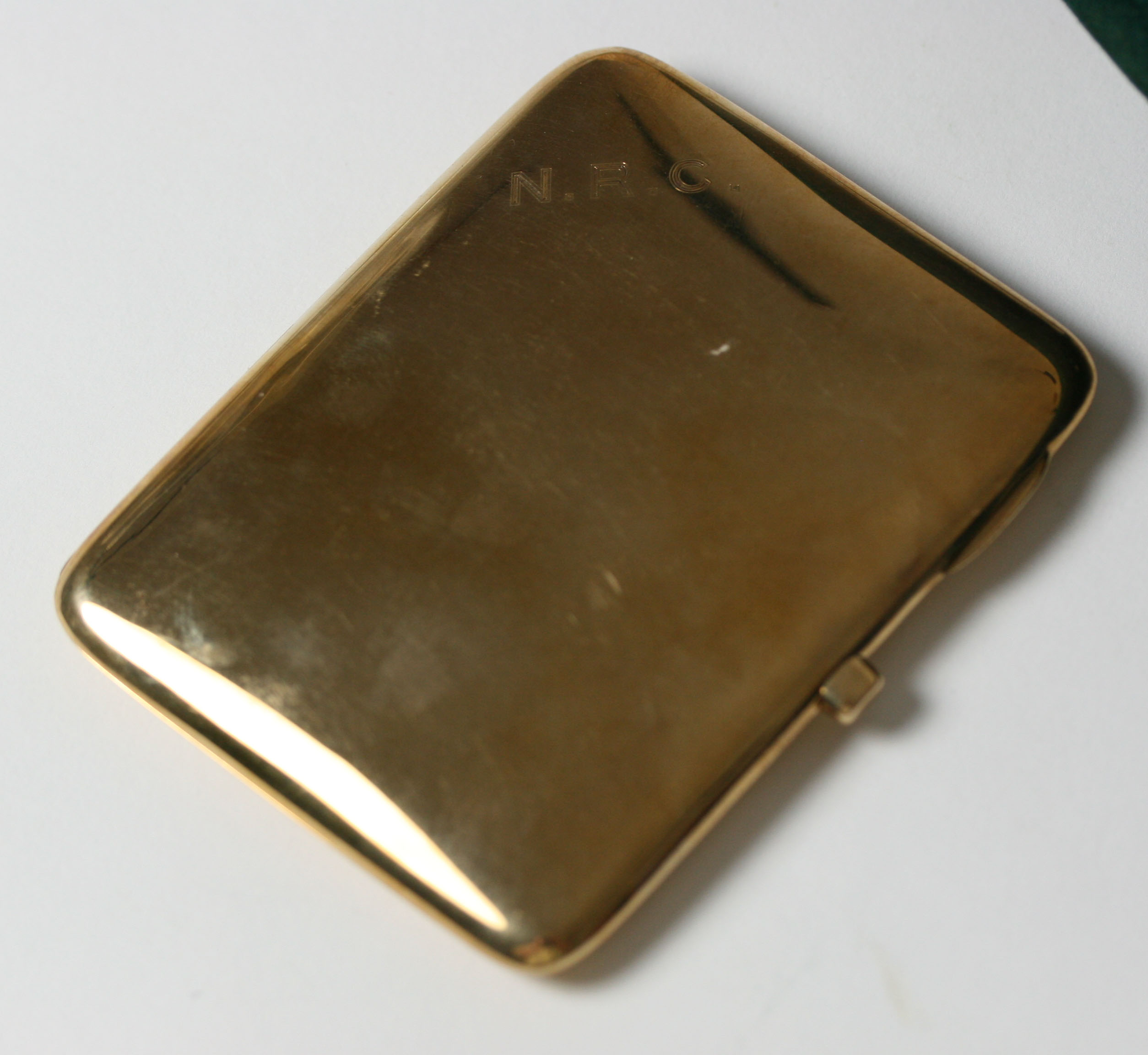 An early 20th century 9ct gold cigarette case