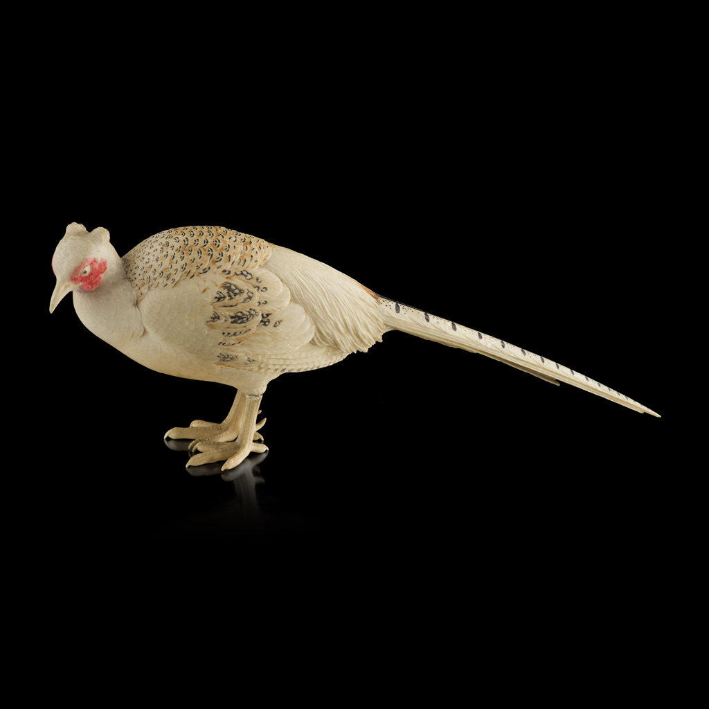 PARTIALLY STAINED IVORY OKIMONO OF A PHEASANT