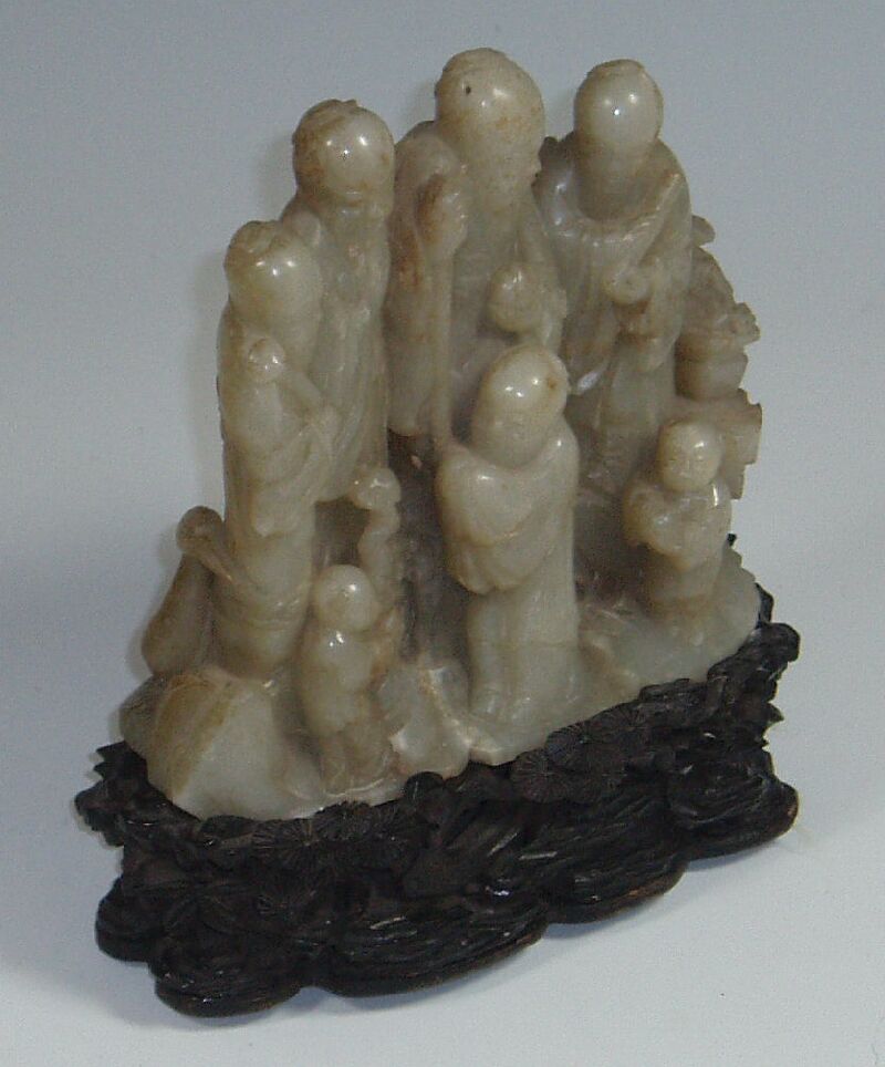 A white jade figure group
