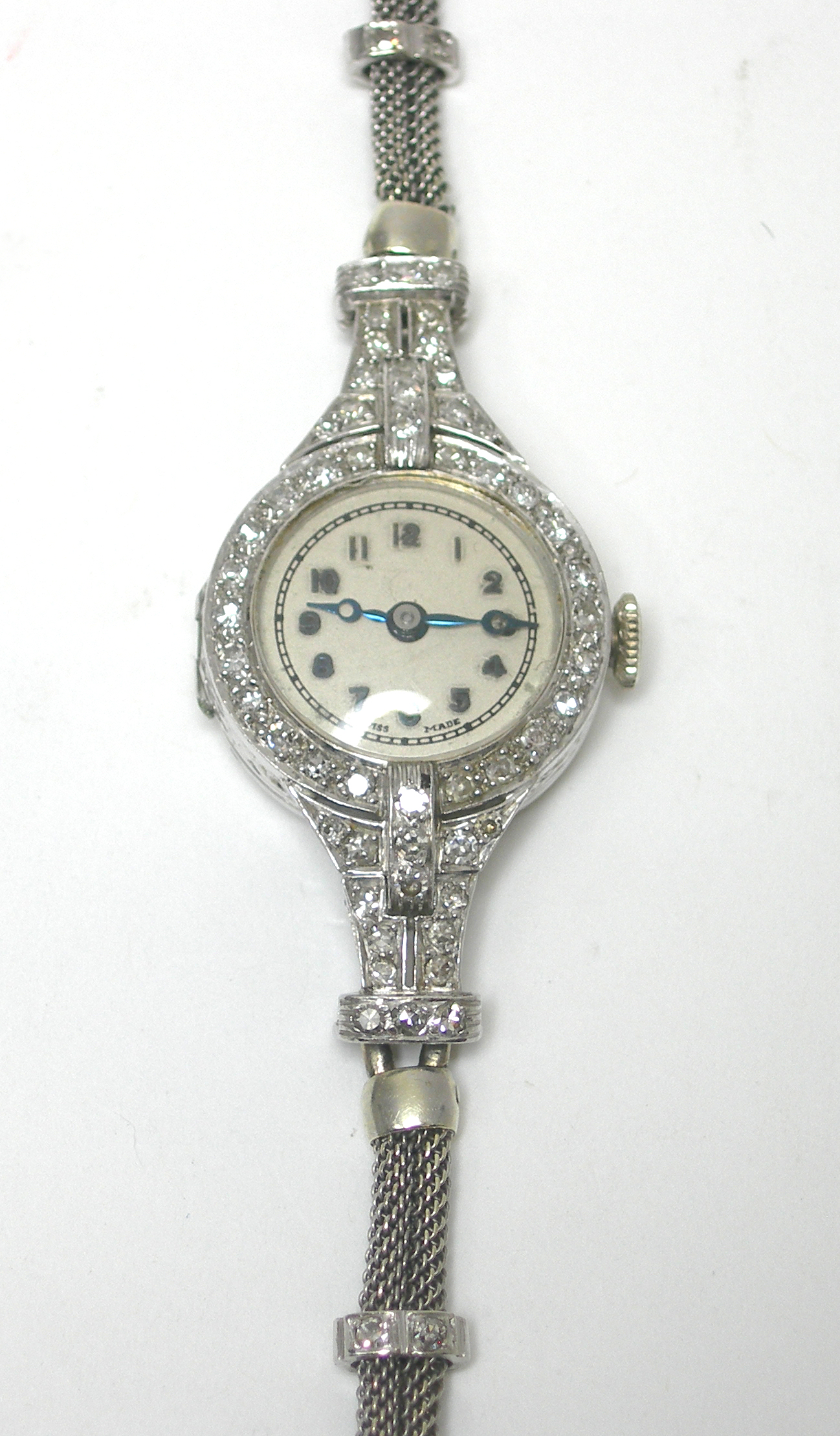 A 1930's platinum and diamond cocktail watch,