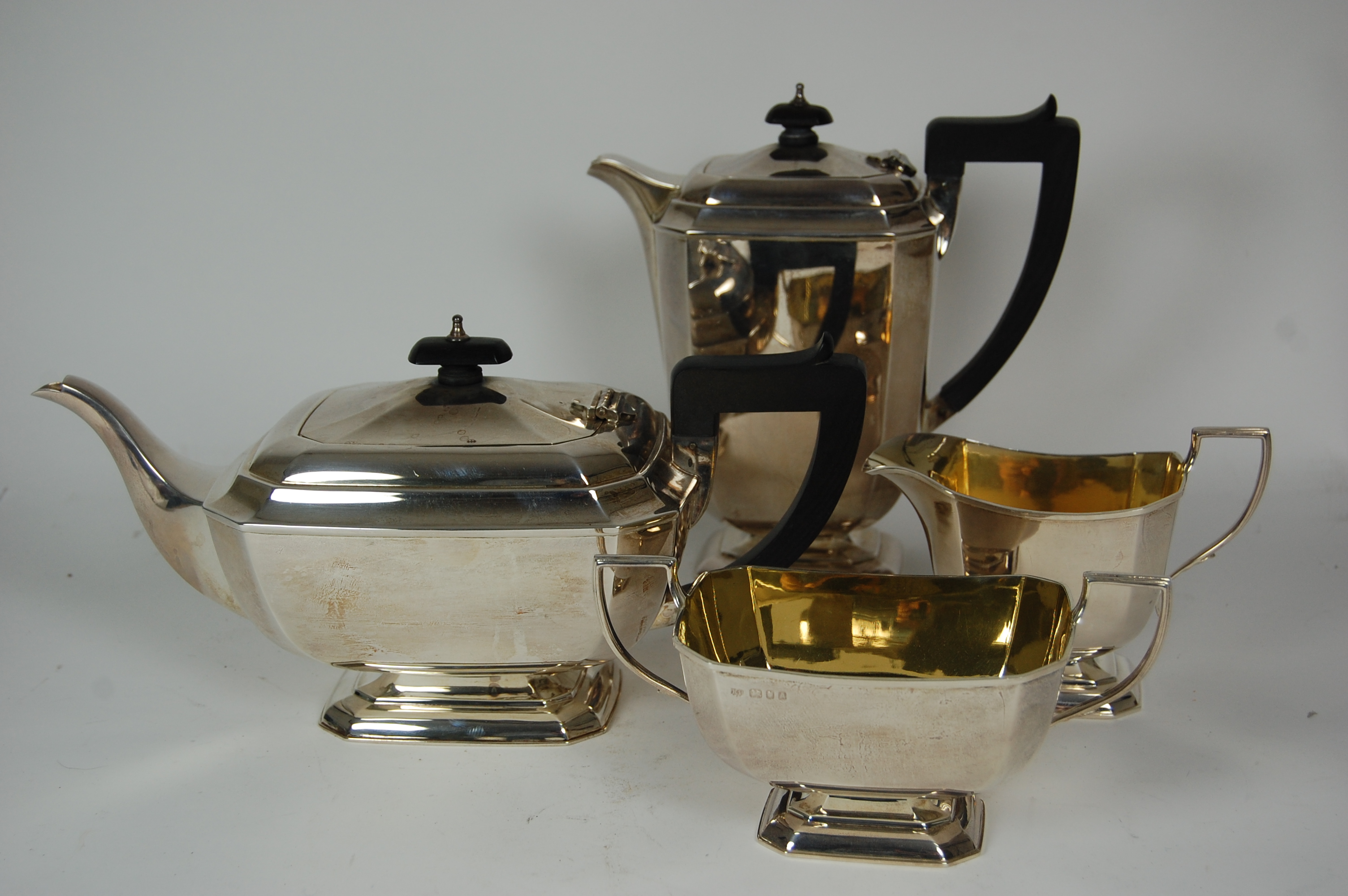 A four piece silver tea service