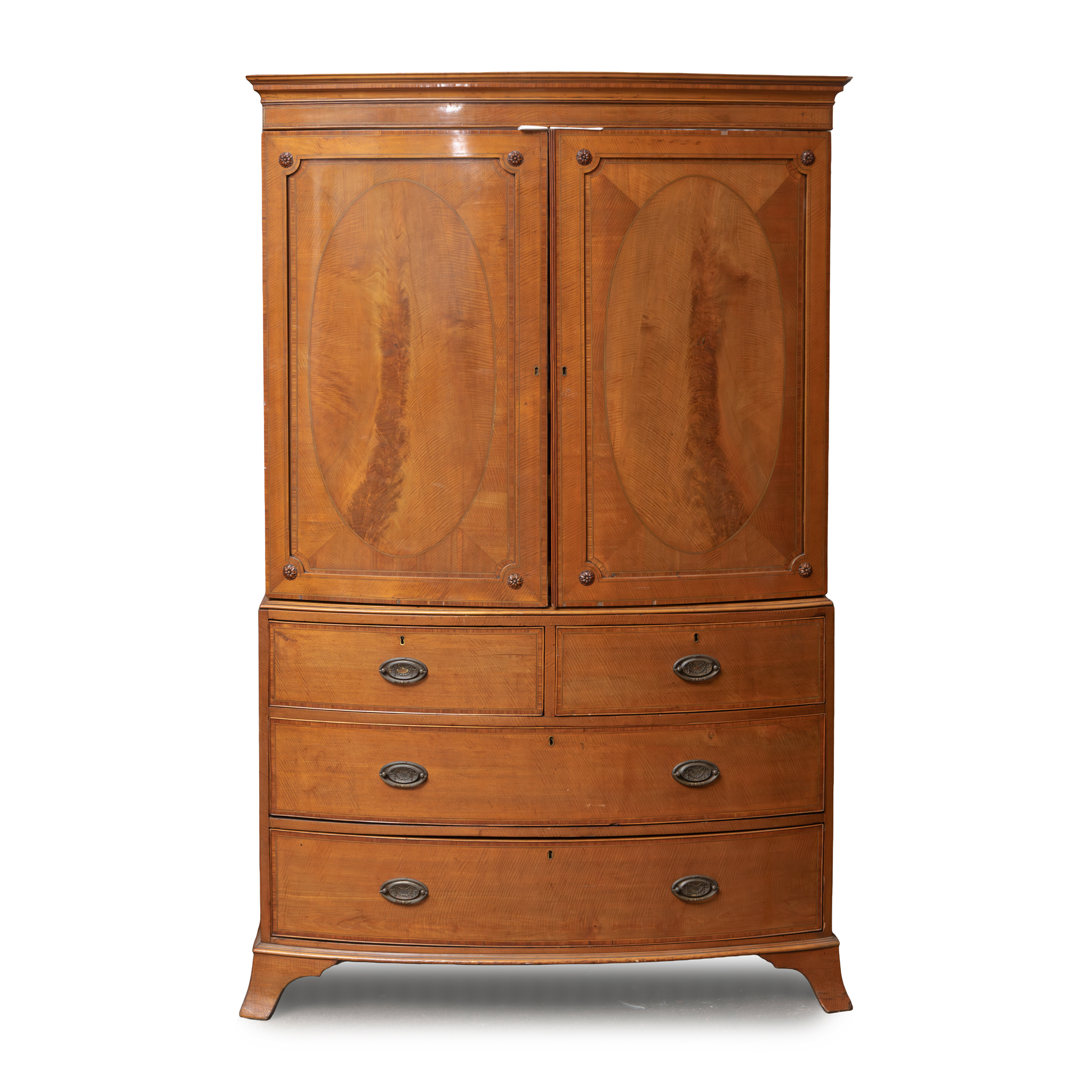 GEORGE III SATINWOOD AND CROSS BANDED BOWFRONT LINEN PRESS.