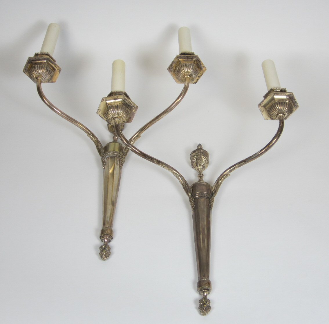 PAIR OF SILVERED WALL SCONCES