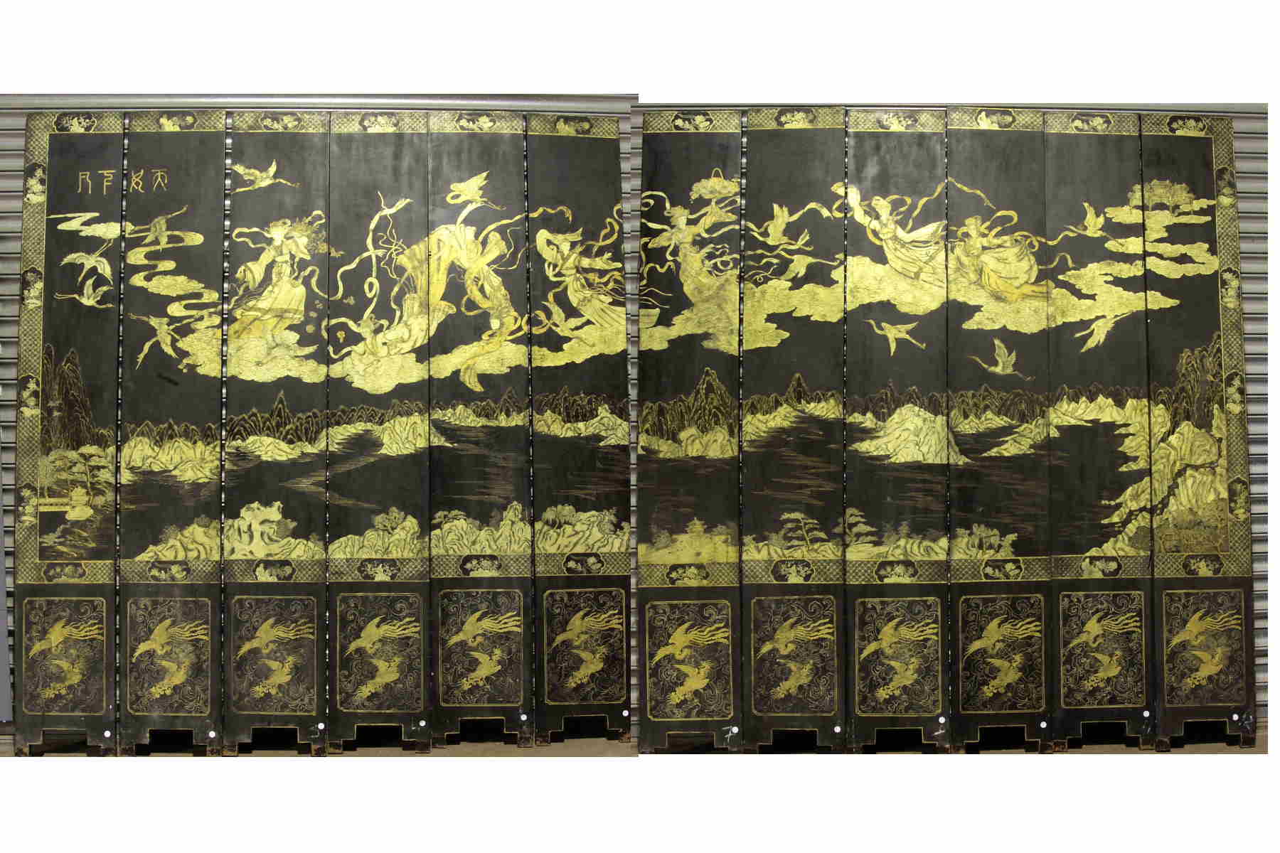 A 19th century Chinese black and gilt lacquer twelve fold barrier screen