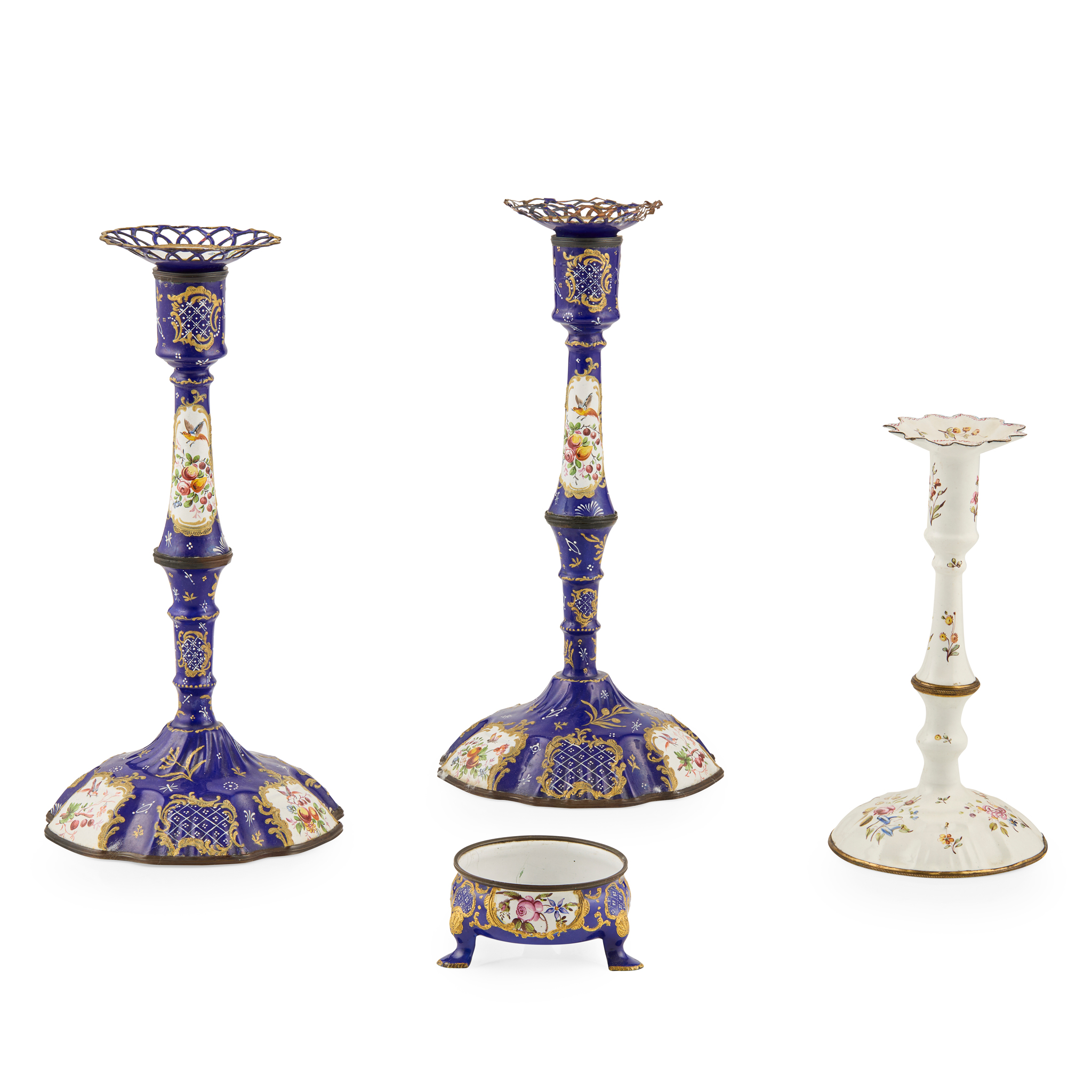 THREE GEORGE III ENAMEL CANDLESTICKS