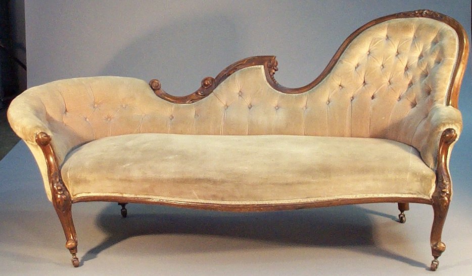 A Victorian stained walnut chaise longue