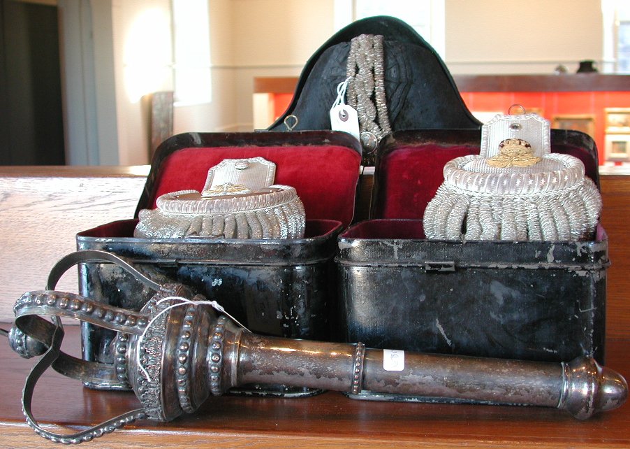 Two pairs of tin cased epaulettes