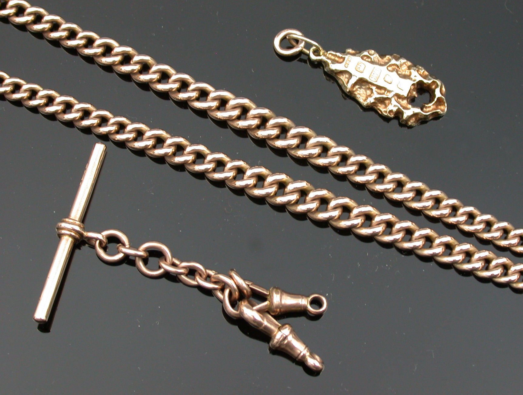 A 9ct rose gold Albert,