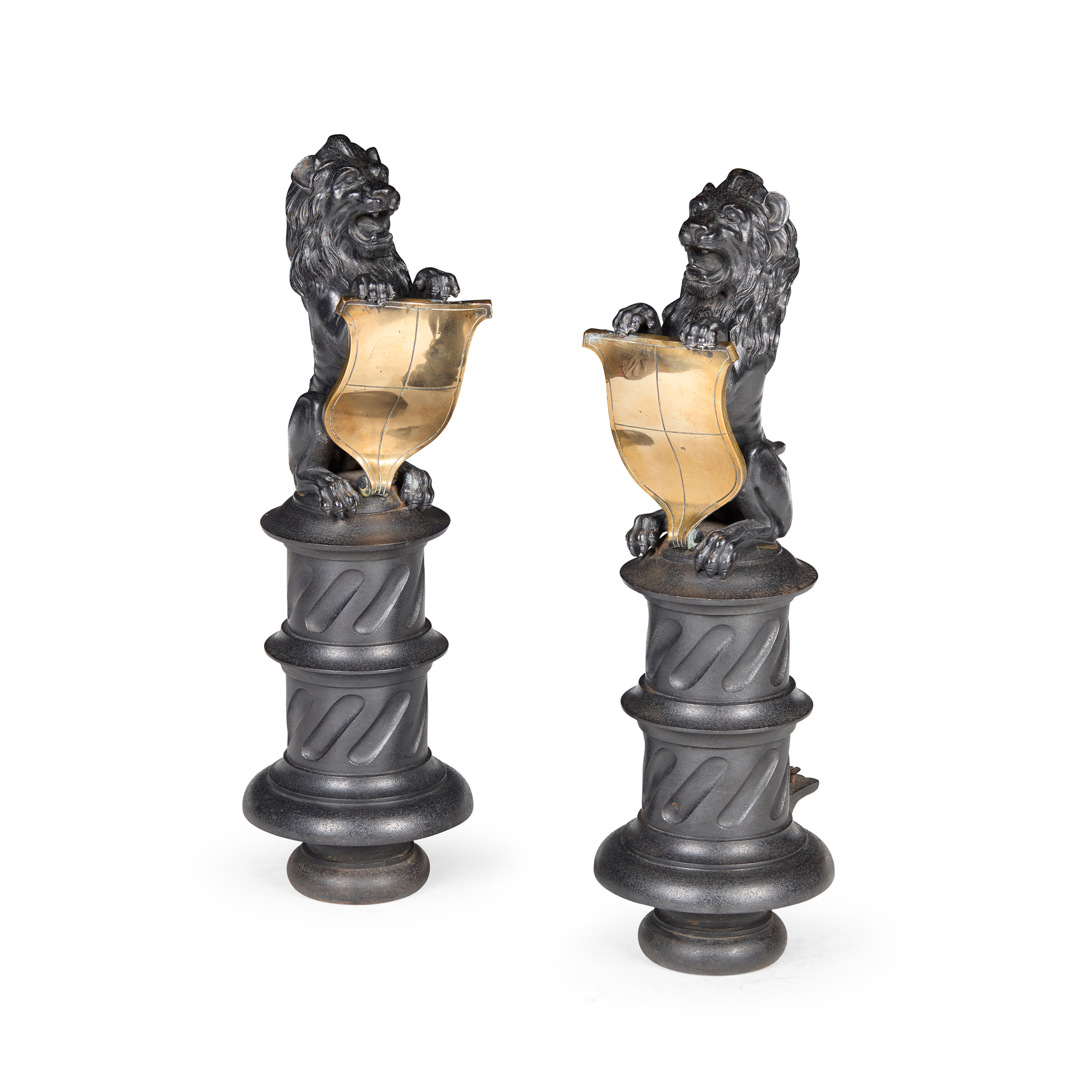 PAIR OF BAROQUE STYLE CAST IRON AND BRASS FIRE DOGS