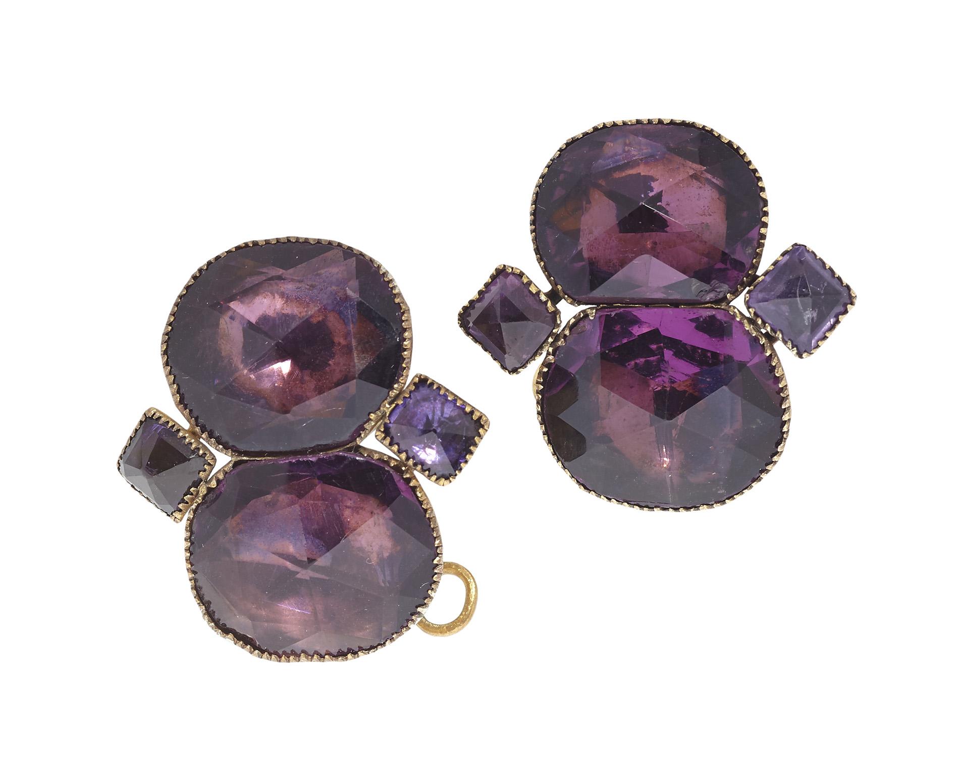 An early 18th century style matched near pair of purple paste set earrings