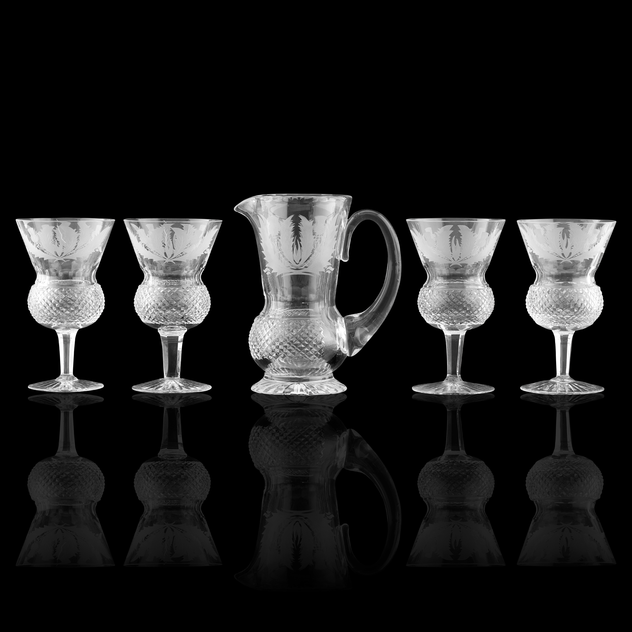 A PART-SUITE OF EDINBURGH CRYSTAL 'THISTLE' PATTERN GLASS