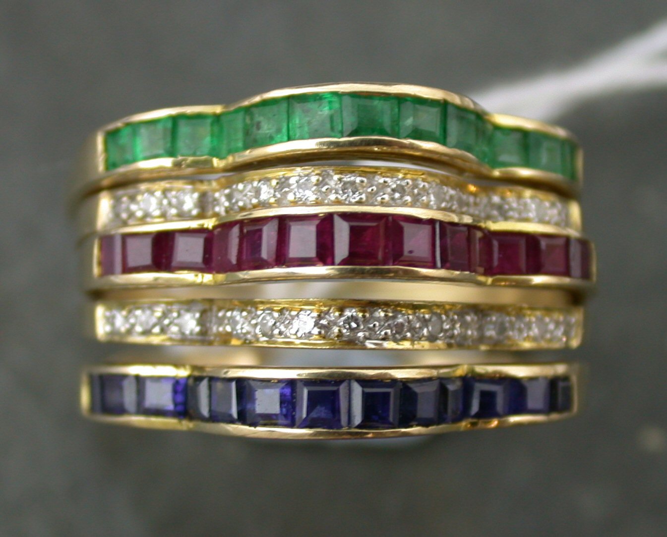 An interchangeable suite of gem set rings,