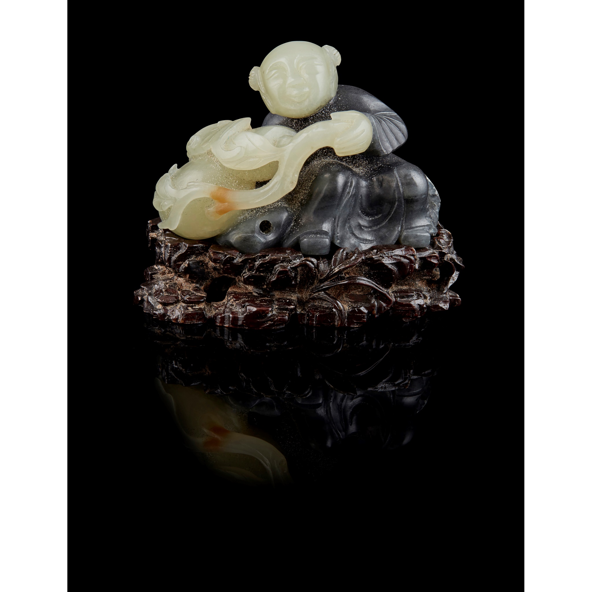 CELADON JADE CARVING OF A BOY