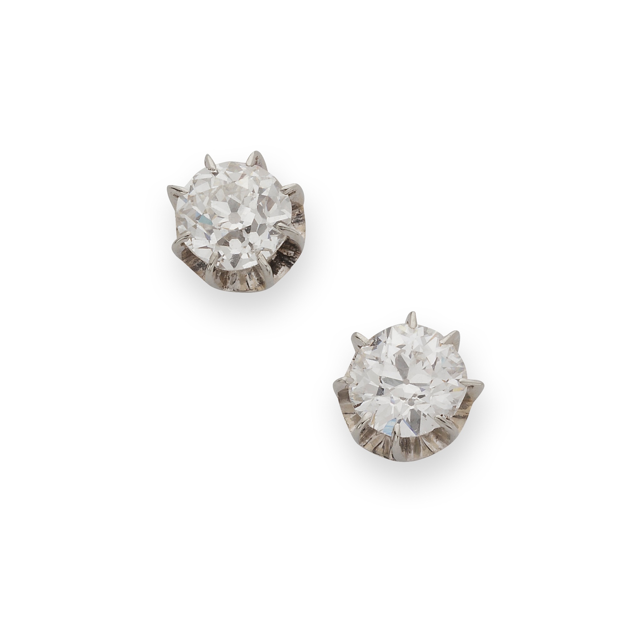 A pair of diamond stud earrings