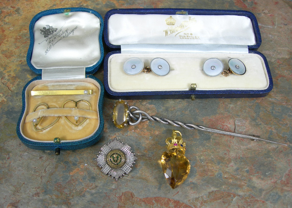 A pair of 9ct gold and platinum mounted cufflinks,