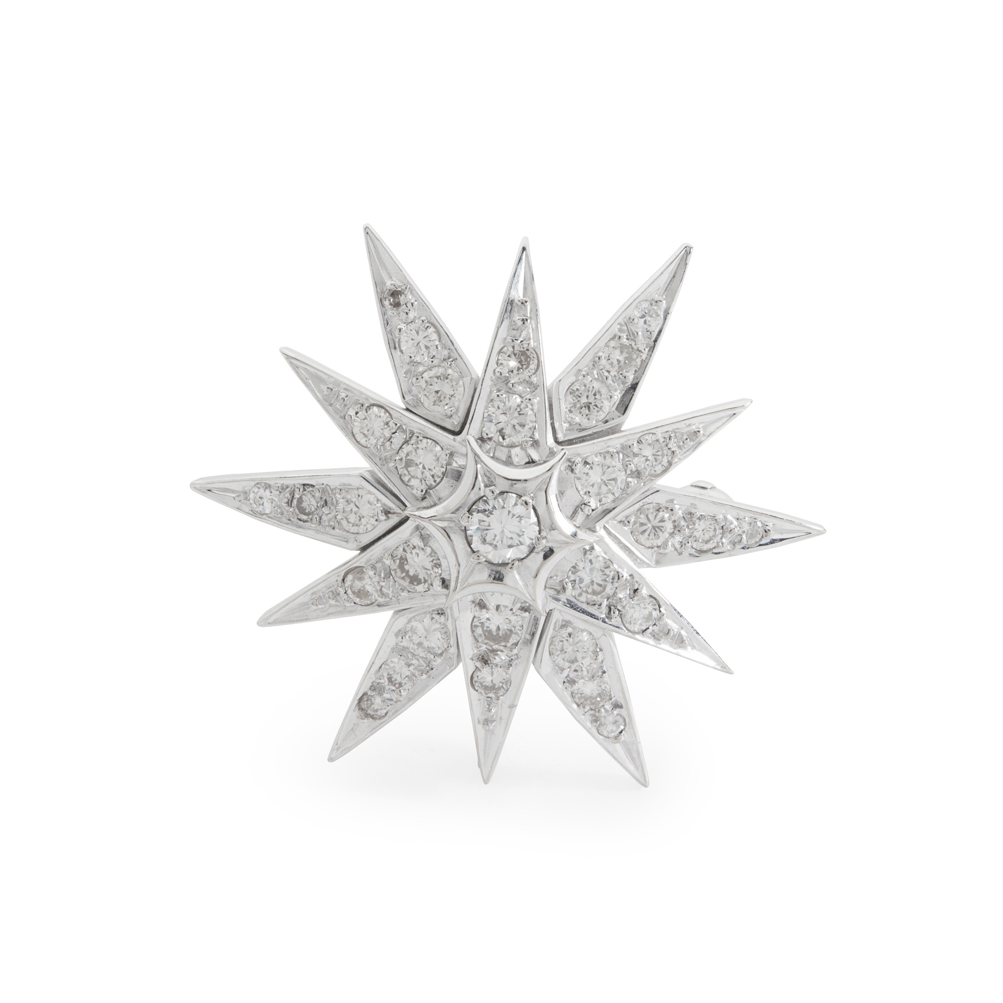 A diamond star brooch