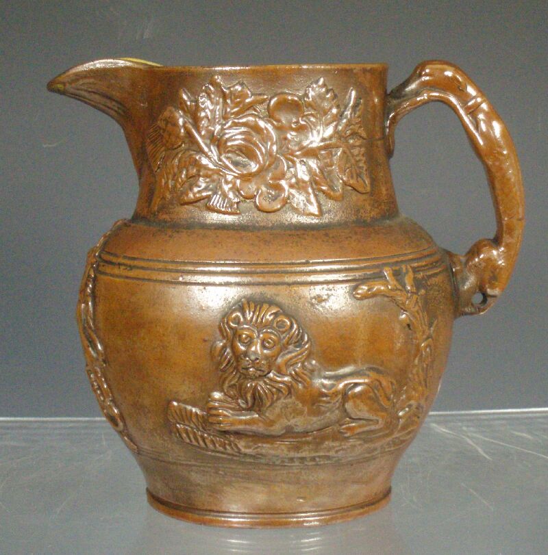 A 19th century salt glazed earthenware jug