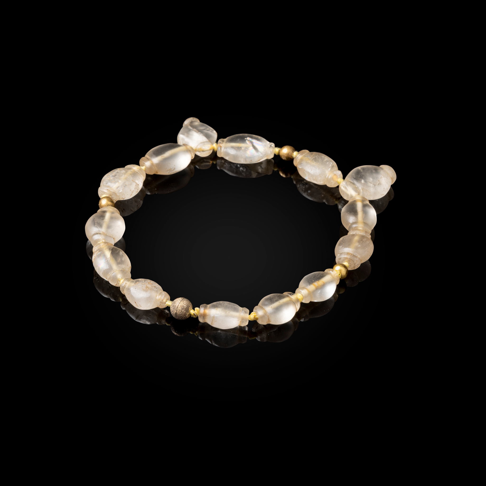 A FATIMID ROCK CRYSTAL COMPOSITE NECKLACE