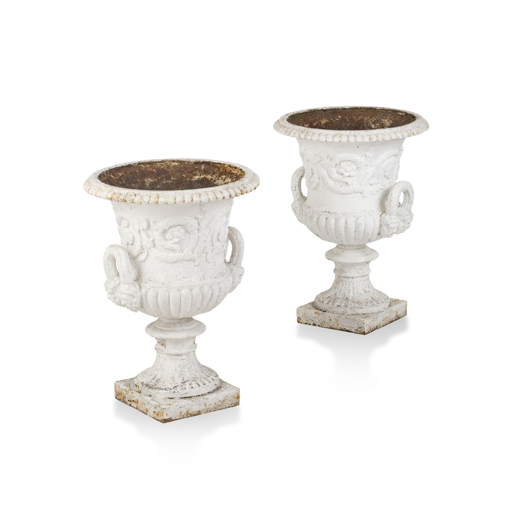 PAIR OF WHITE PAINTED CAST IRON URNS