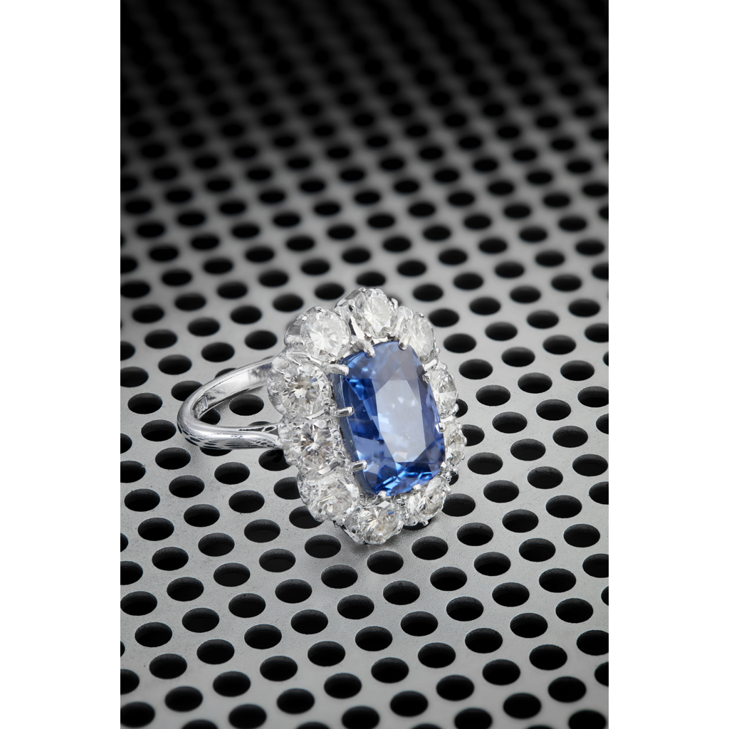 A large sapphire and diamond set cluster ring