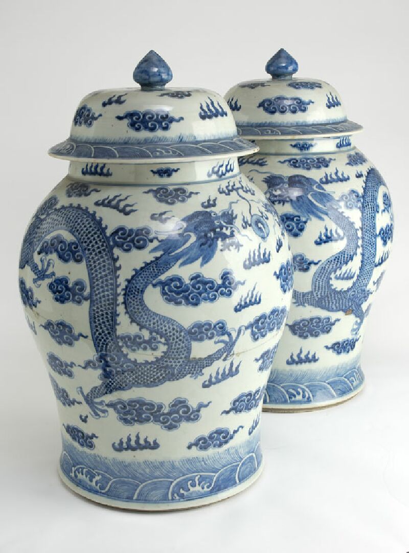 A pair of large 19th century Chinese blue painted vases and covers
