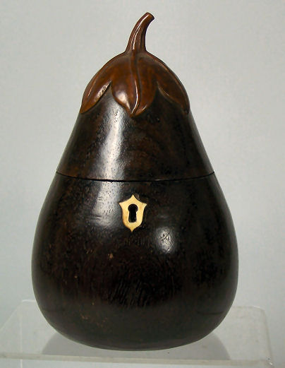 A 19th century carved aubergine tea caddy