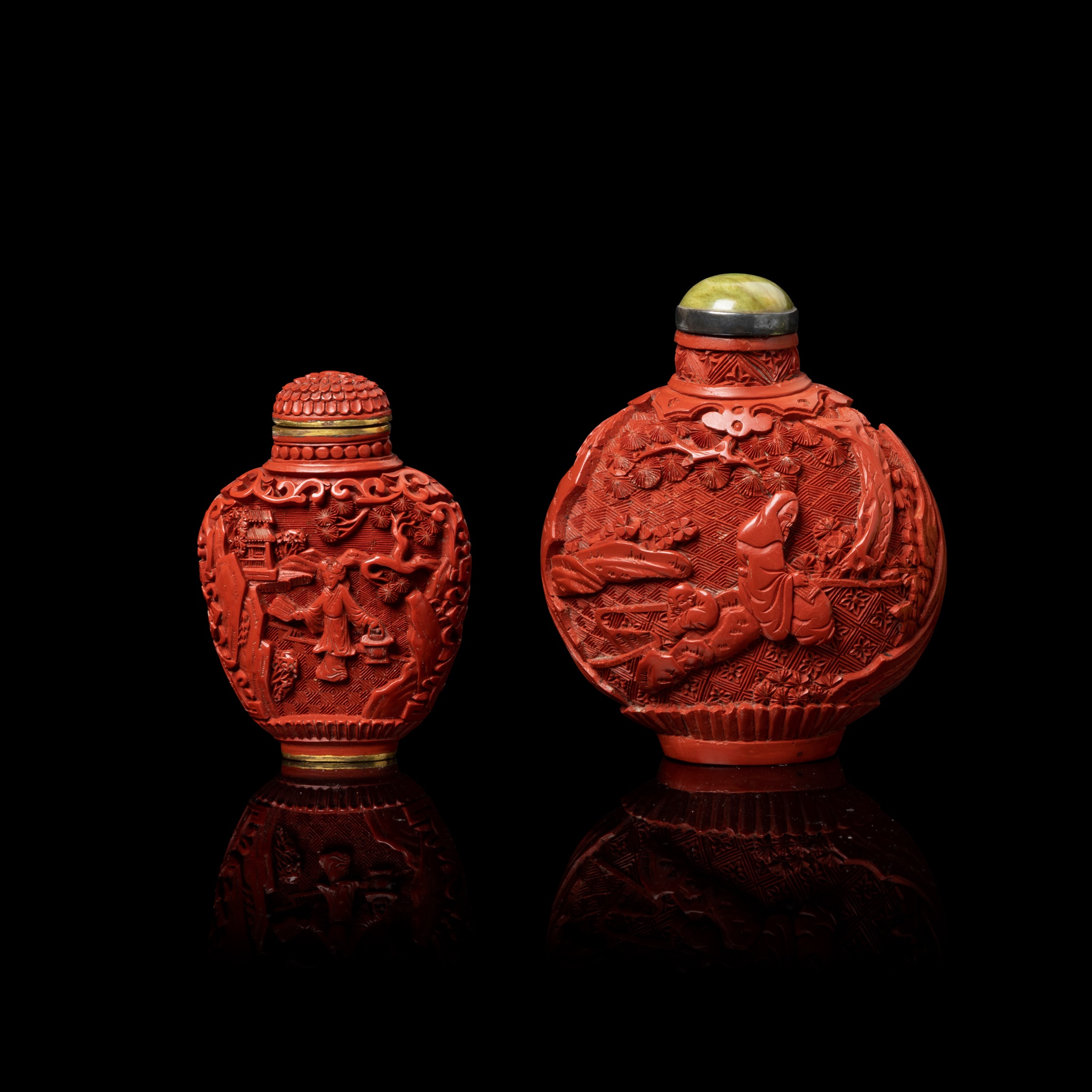 TWO CARVED CINNABAR LACQUER SNUFF BOTTLES