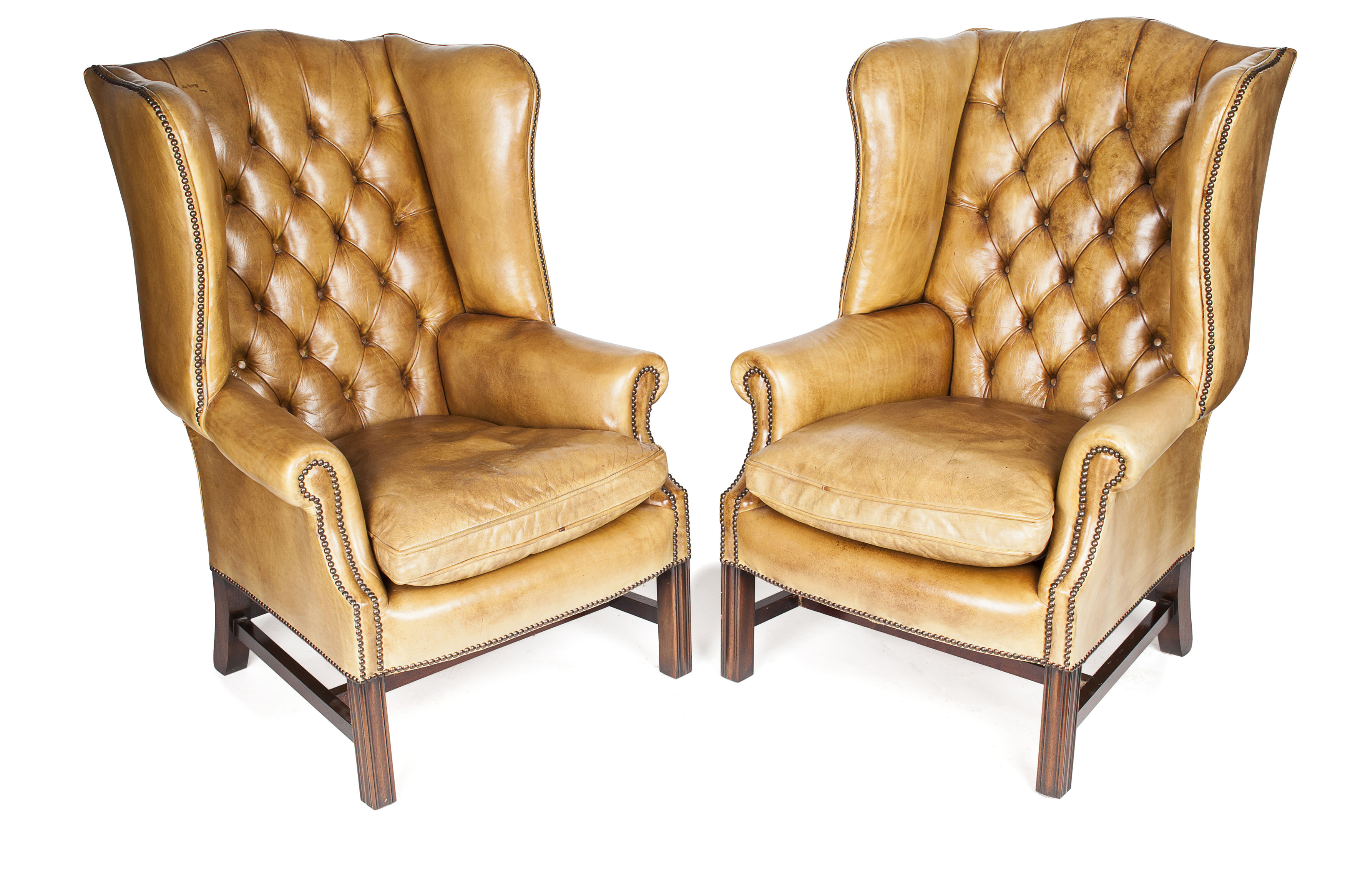 PAIR OF GEORGIAN STYLE LEATHER WING ARMCHAIRS