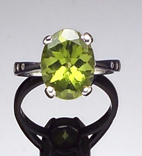 A peridot and diamond ring,