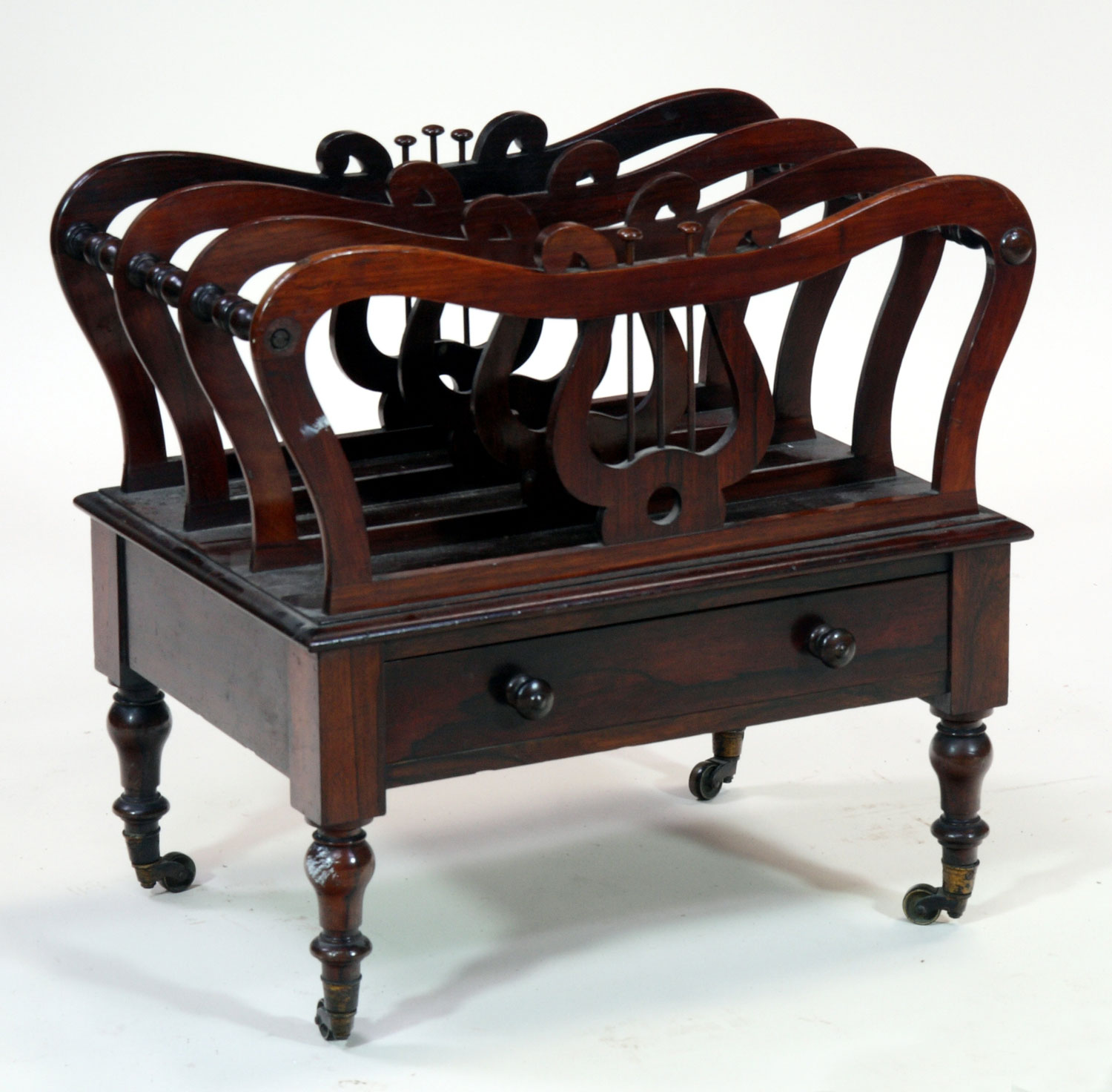 A Victorian rosewood Canterbury