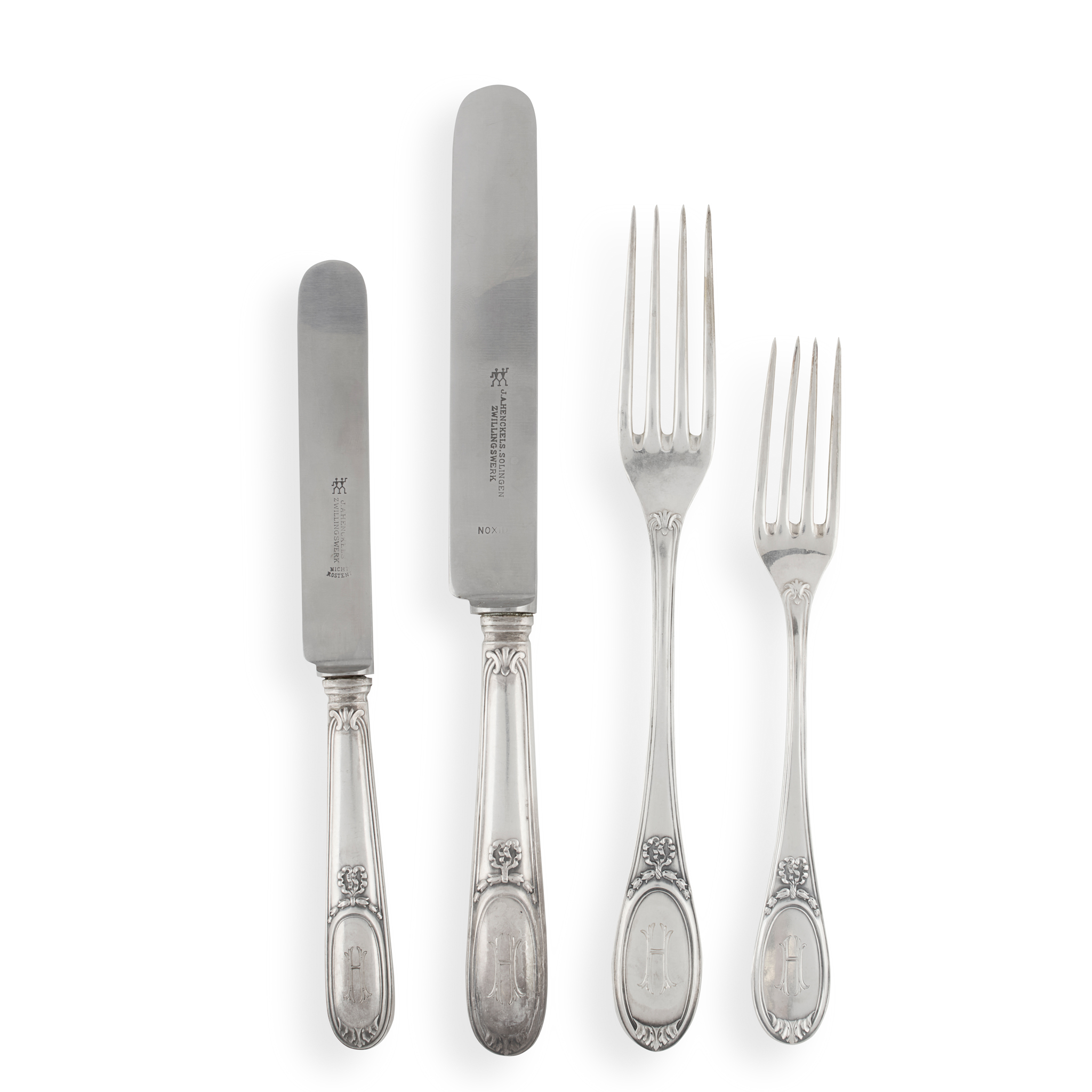 AN EARLY 20TH CENTURY GERMAN SUITE OF FLATWARE