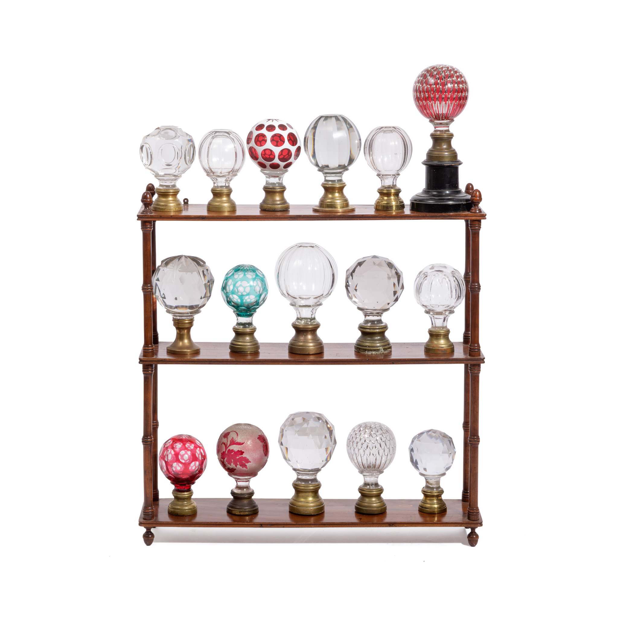 A COLLECTION OF SIXTEEN VARIOUS MOULDED GLASS NEWALL POST FINIALS