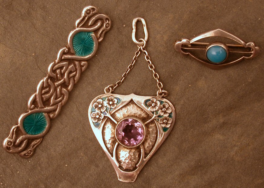 A Murrle Bennett Art Nouveau silver and enamel pendant