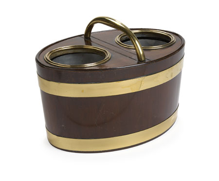 A George III period mahogany and brass bound bottle carrier