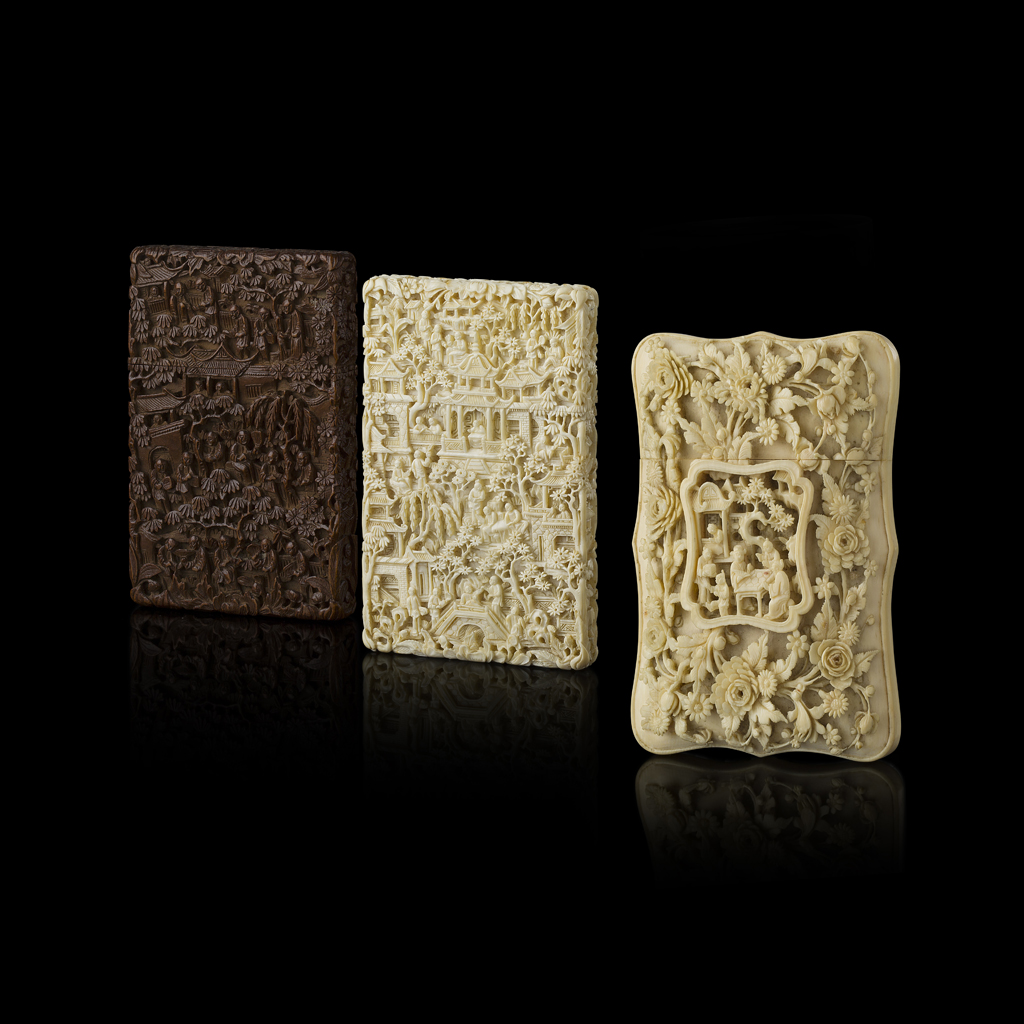 TWO CANTON IVORY CARD CASES AND A SANDALWOOD CARD CASE