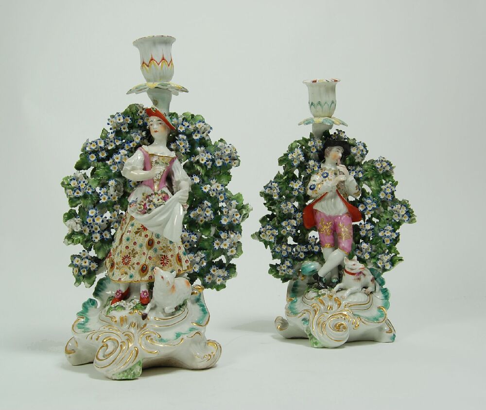 A pair of late 18th century Chelsea (Derby) candlesticks