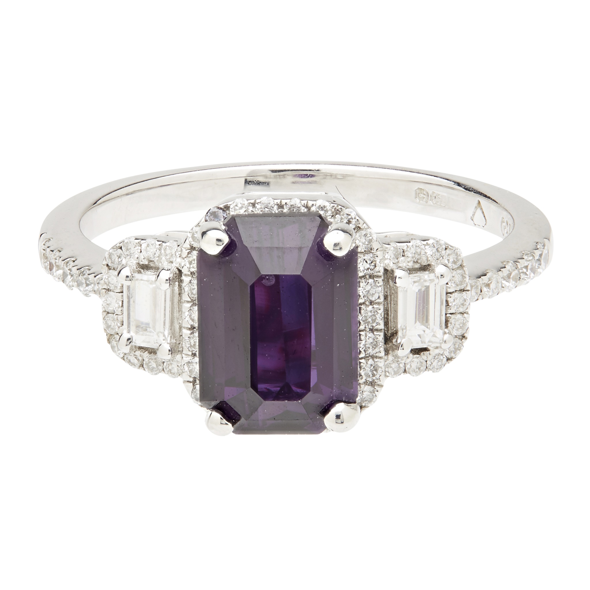 A purple sapphire and diamond set ring