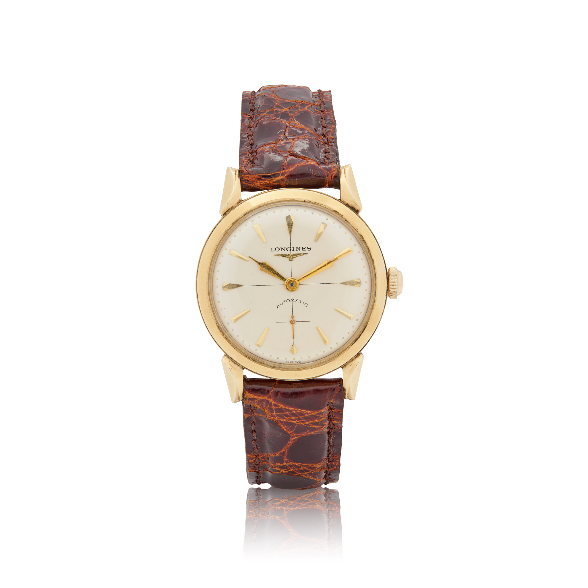 Longines. A 14k yellow gold automatic wristwatch