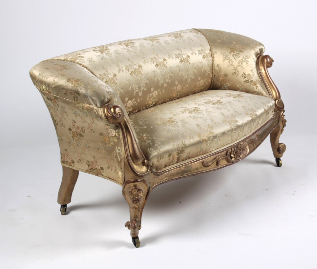 A 19th century giltwood sofa