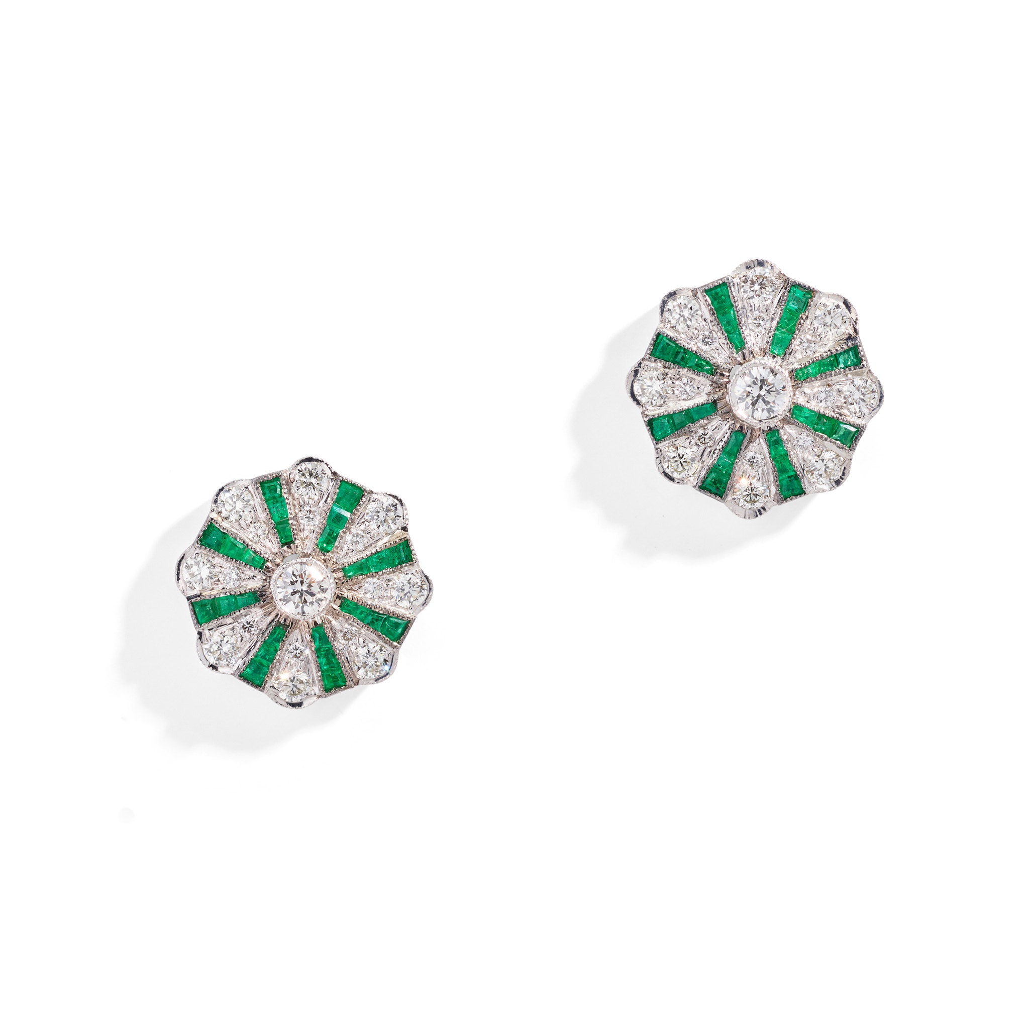 A pair of emerald and diamond earrings