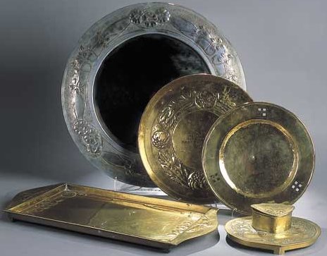 A Scottish Guild of Handicrafts circular brass charger